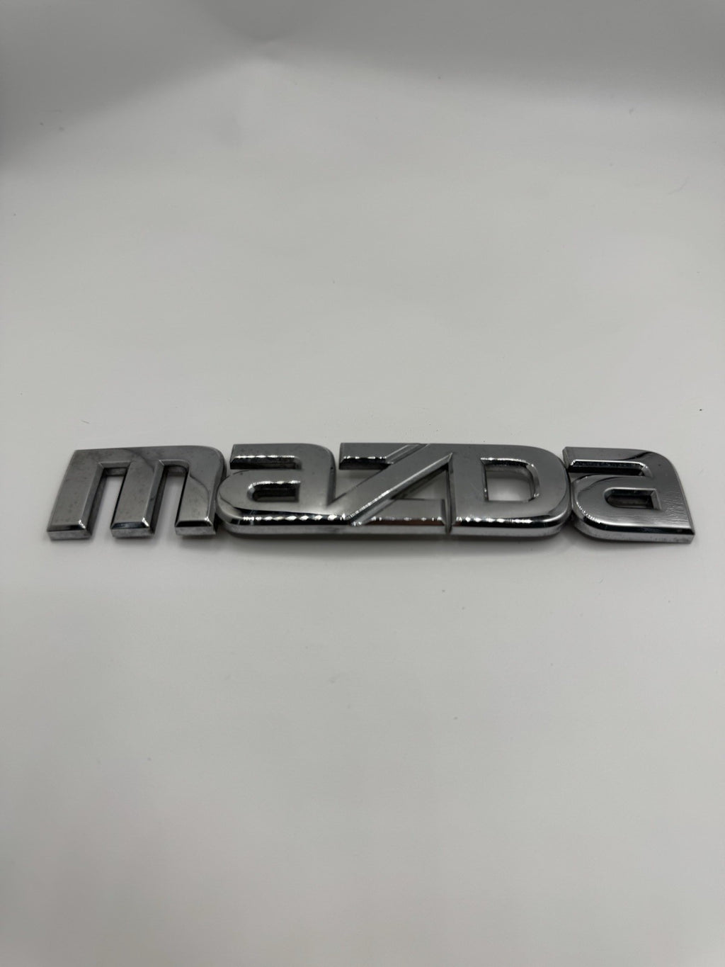 Genuine OEM Mazda BN8V-51-710A "MAZDA" Nameplate Emblem Badge 2004-20090